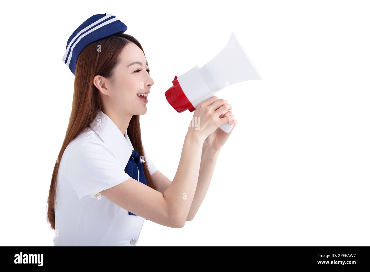 Wunderschöne Stewardess der Fluggesellschaft, die das Megafon hält Stockfoto