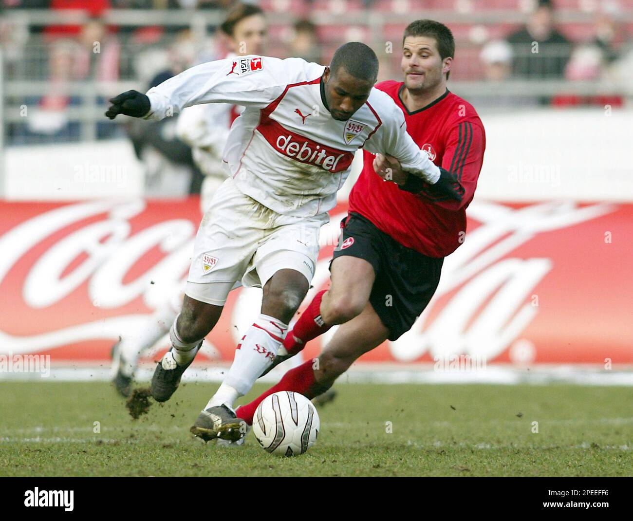 vfb-stuttgart-s-cacau-from-brazil-left-challenges-for-the-ball-with