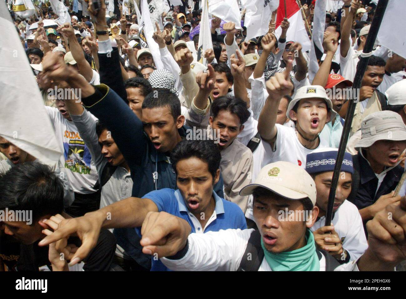 Indonesian Muslims shout anti-U.S. slogans during a protest outside the ...