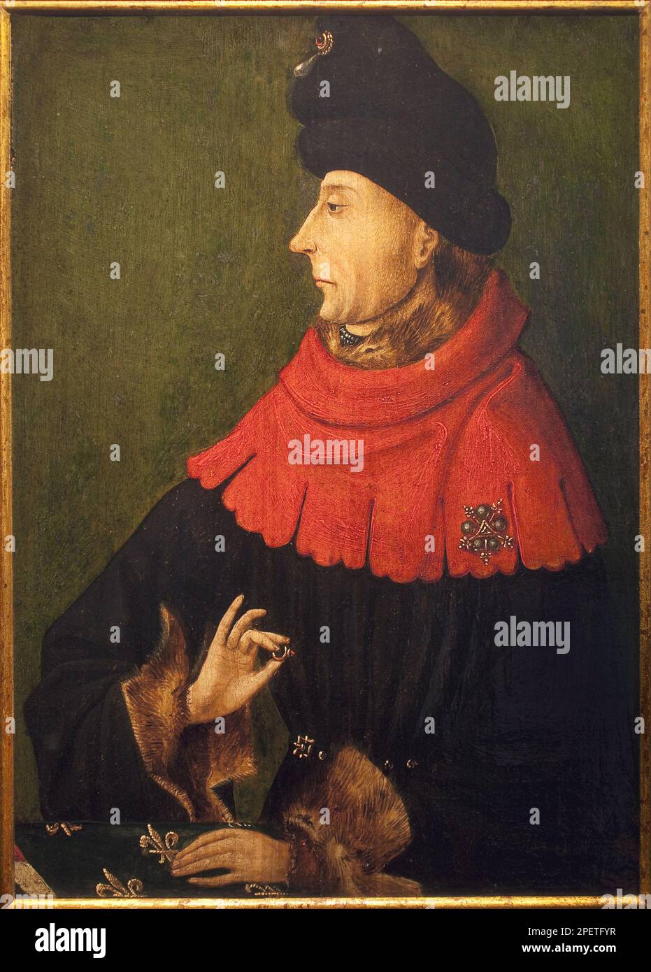 Portrait de Jean Sans Peur, duc de Bourgogne (1371-1419). L'anneau qu'il tient a la main est le rubis de Bourgogne achete par Philippe le Hardi en 1397, qui etait conserve a l'abbaye de Saint Benigne a Dijon et remis par l'abbe a tout nouveau duc prenant possession du duche de Bourgogne. Peinture par un peintre au Service de Jean sans Peur, huile sur bois vers 1404-1410. Musée des Beaux Arts de Dijon. Stockfoto