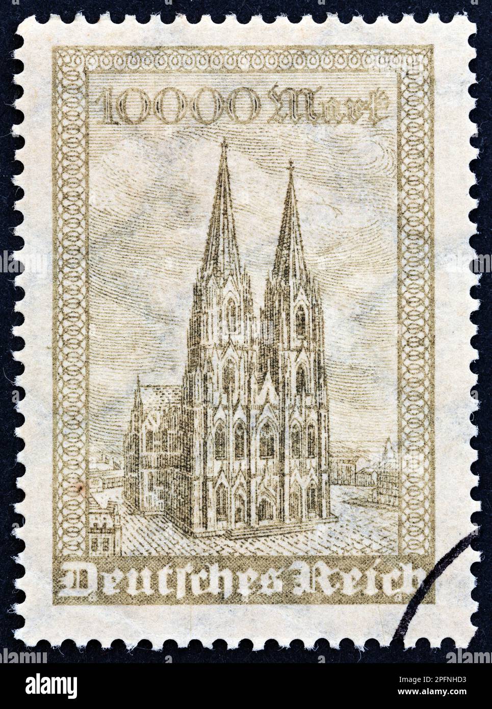 DEUTSCHLAND - CIRCA 1923: Ein in Deutschland gedruckter Stempel zeigt den Kölner Dom, circa 1923. Stockfoto