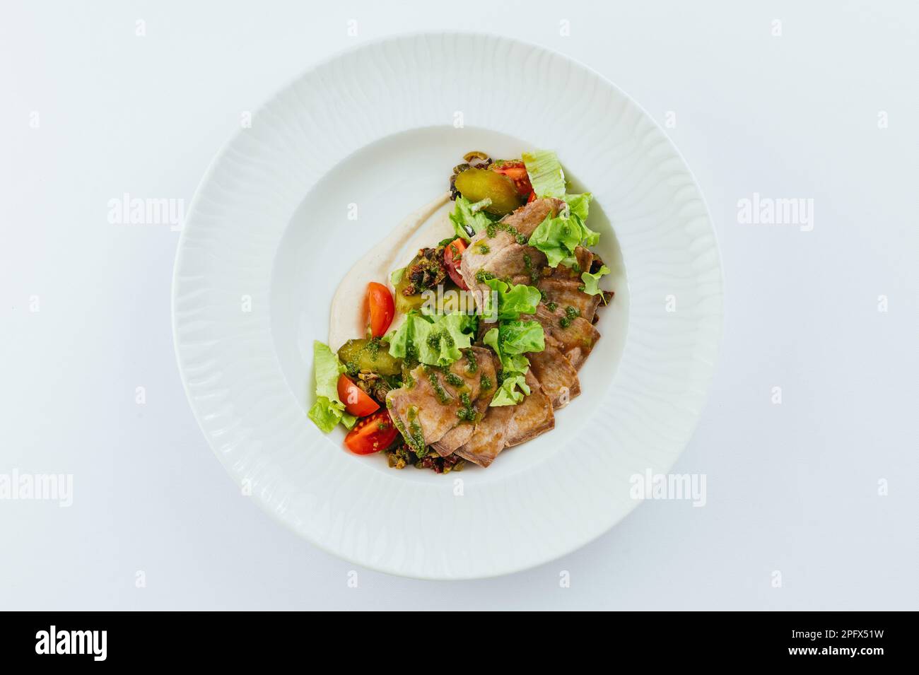Restaurantessen auf weißem Hintergrund. Speisekarte des Restaurants. Fotos für das Menü Stockfoto