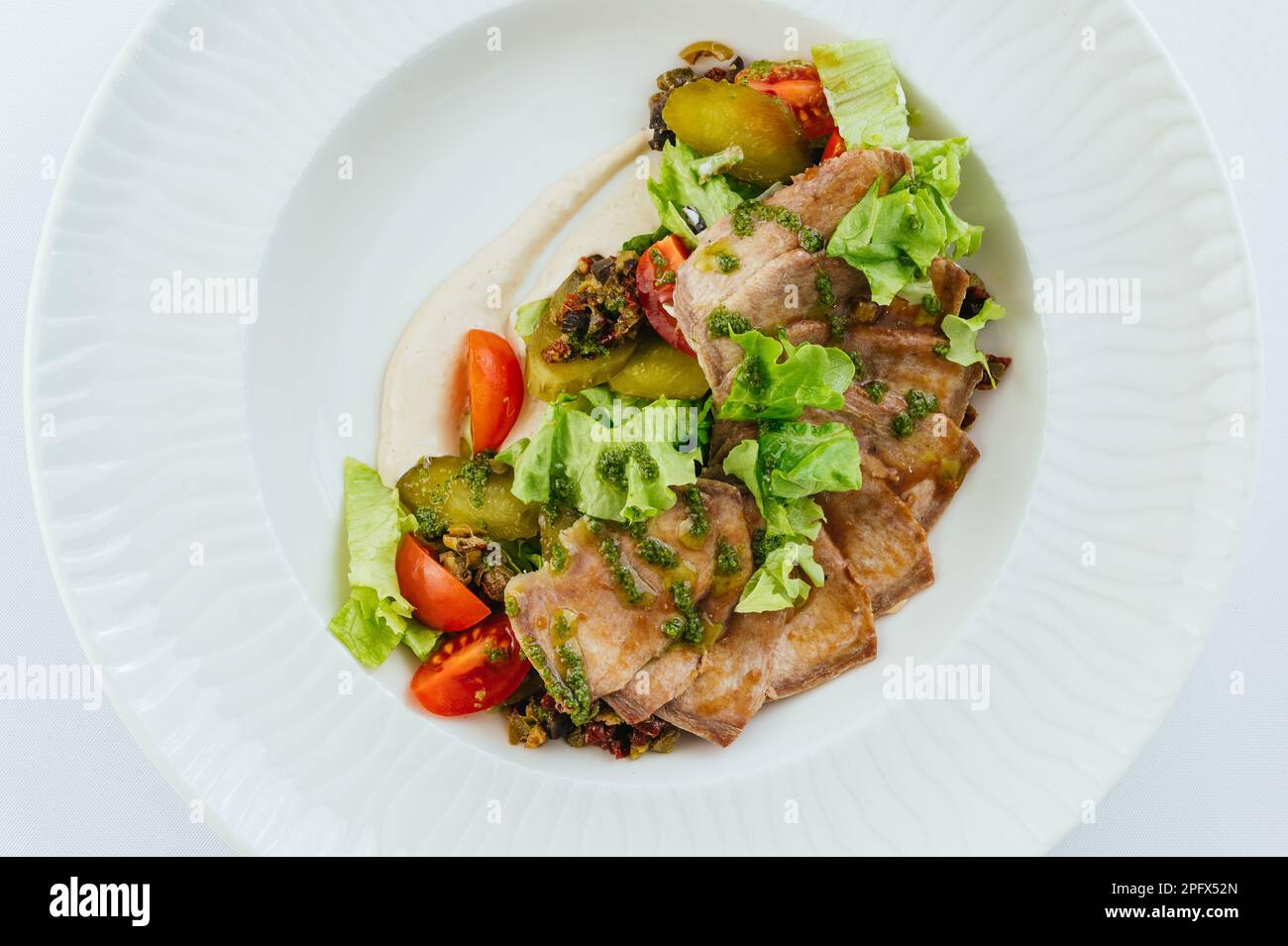 Restaurantessen auf weißem Hintergrund. Speisekarte des Restaurants. Fotos für das Menü Stockfoto