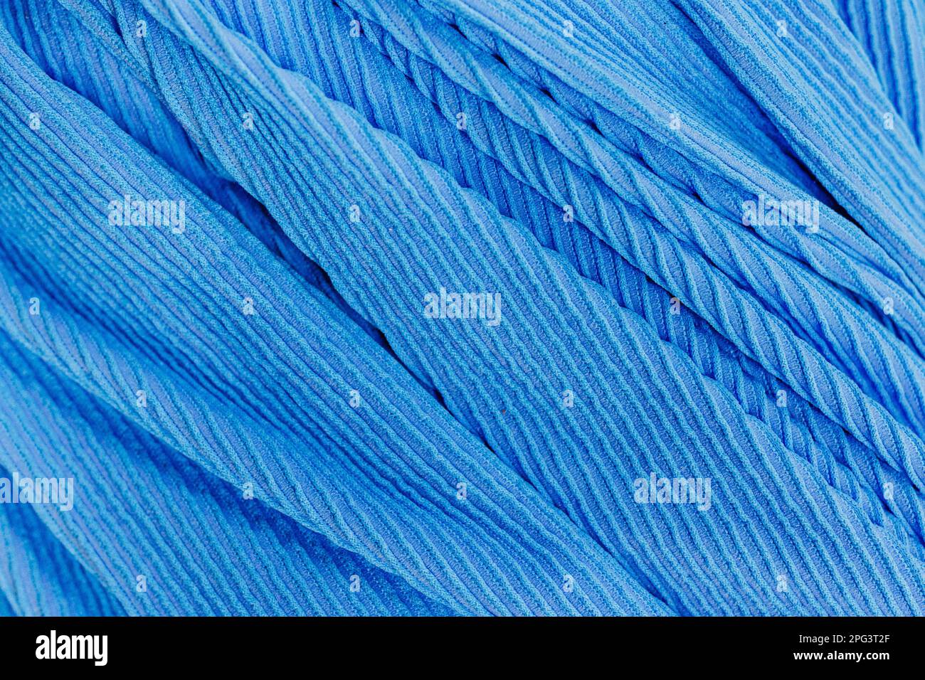 Eine Nahaufnahme eines weichen blauen Stoffhintergrunds Stockfoto