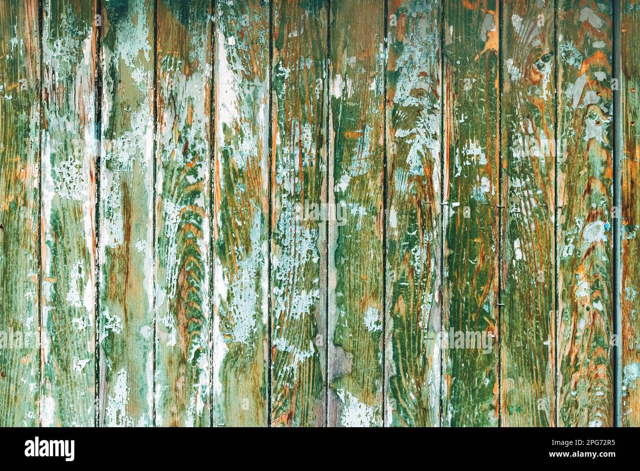 Abblätternde Farbstruktur einer alten Holzwandoberfläche als Grunge-Hintergrund Stockfoto
