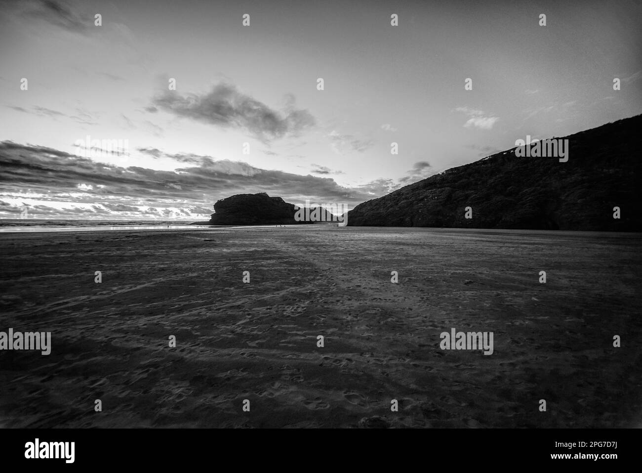 TE Henga Beach (Bethells Beach) bei Sonnenuntergang Stockfoto