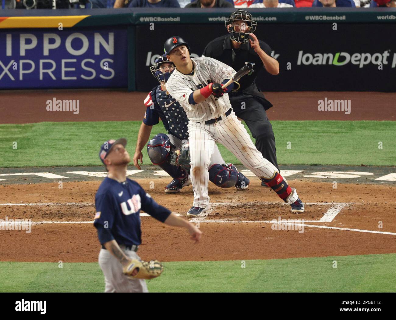 Japan's Kazuma Okamoto homers in the 4th inning of the World Baseball