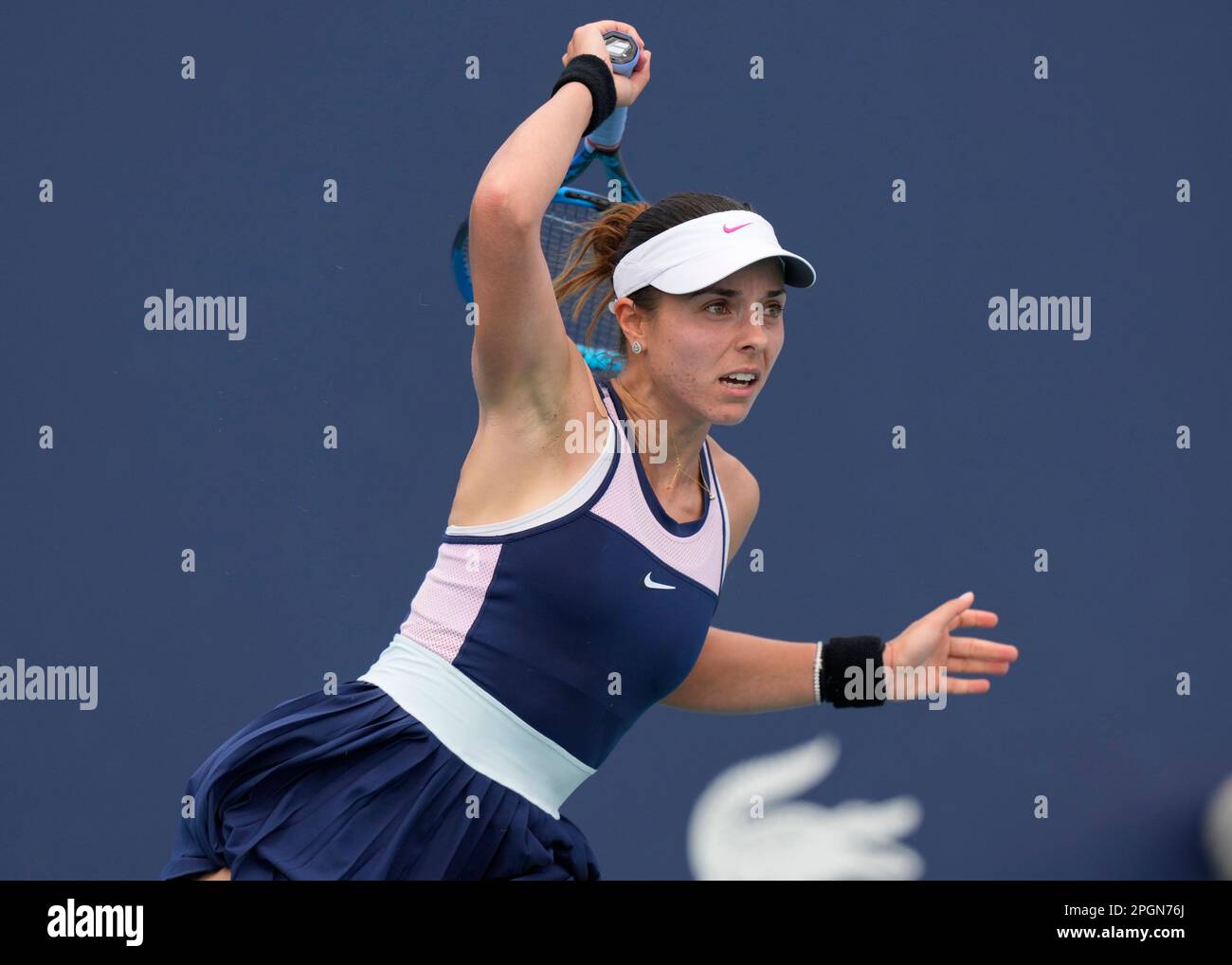 Viktoriya Tomova of Bulgaria returns to Danielle Collins during the