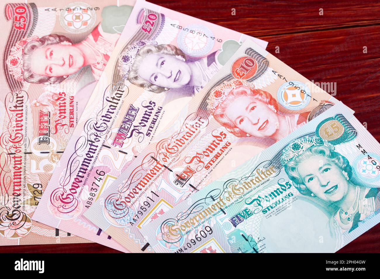 Gibraltar-Geld - Pfund - ältere Serie, ein geschäftlicher Hintergrund Stockfoto