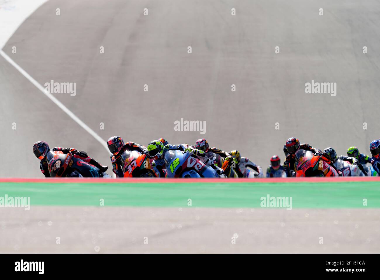 Riders take the first curve at the start of the Moto 2 race during the