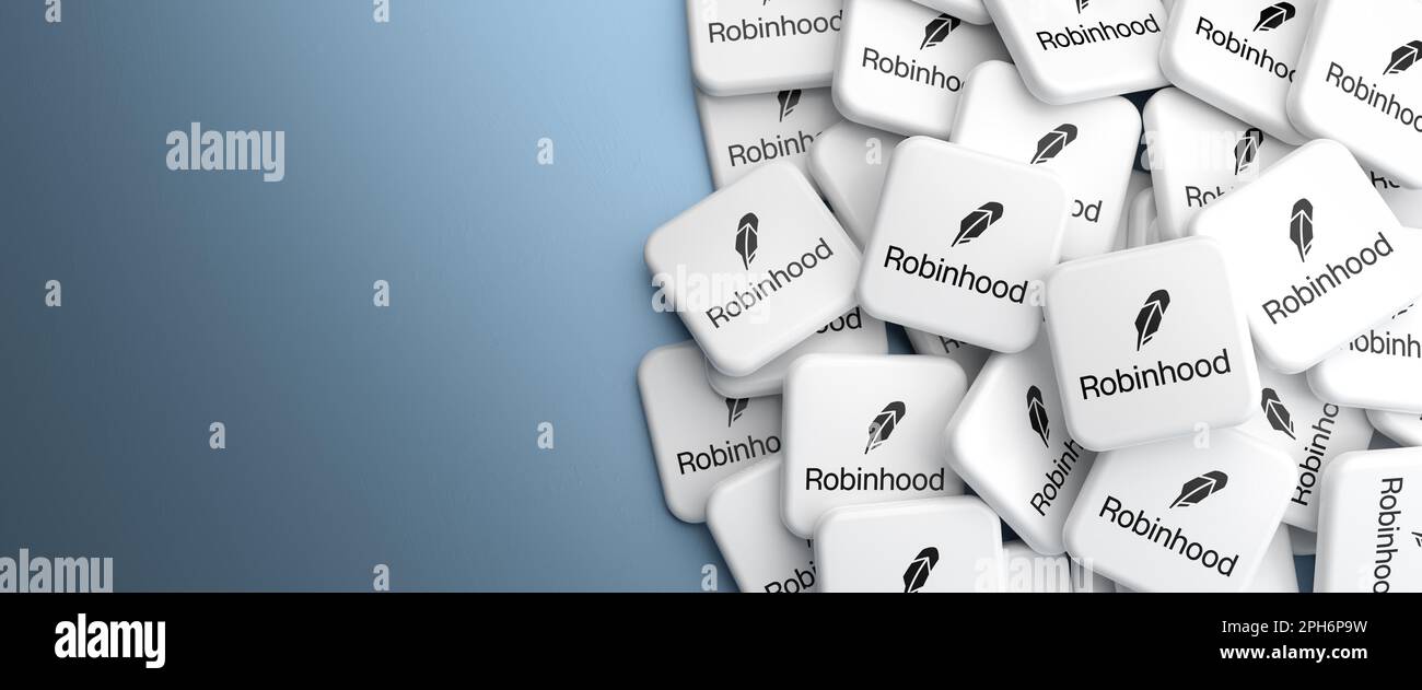 Logos des Neo Brokers Robinhood auf einem Haufen auf einem Tisch. Webbannerformat, Kopierbereich Stockfoto