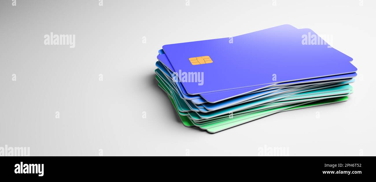 Ein Stapel Kreditkarten isoliert auf grauem Hintergrund. Farbverlauf Grün zu Blau Stockfoto
