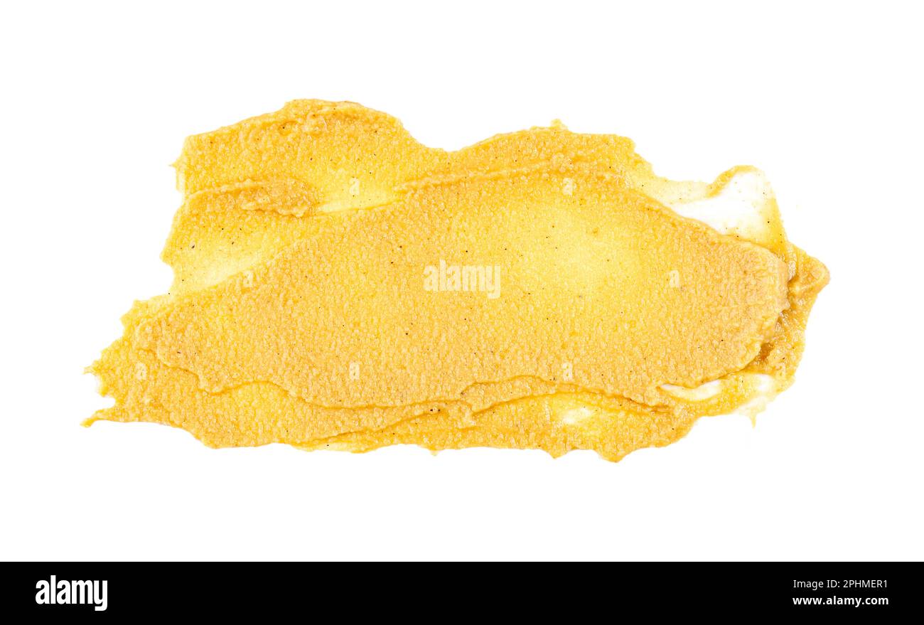 Gelber abstrakter Abstrich von Senfsauce isoliert auf weißem, Draufsicht, Schnittpfad Stockfoto