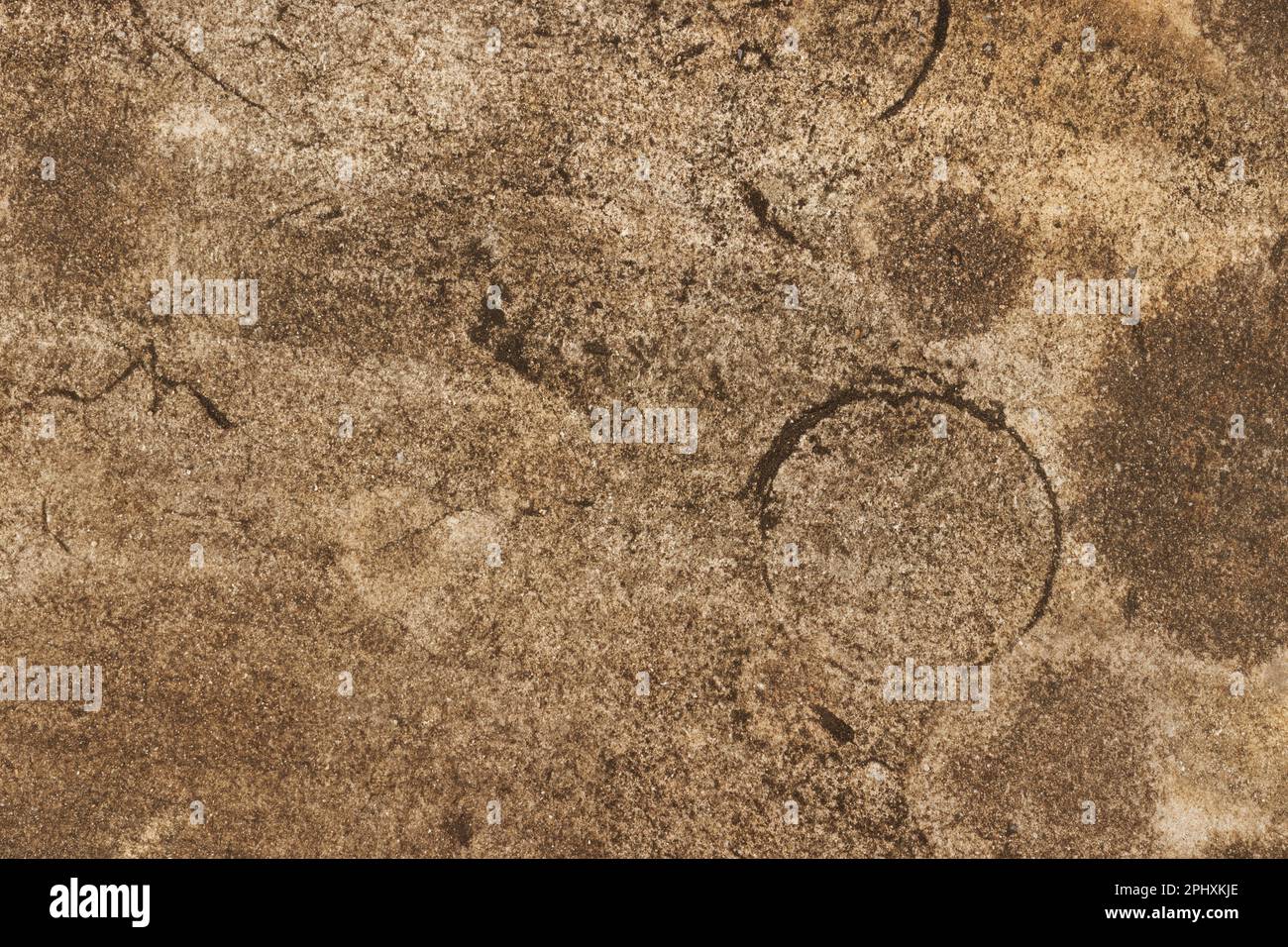 Braunes Beton- oder Zementmaterial in abstrakter Wandhintergrundstruktur. Stockfoto