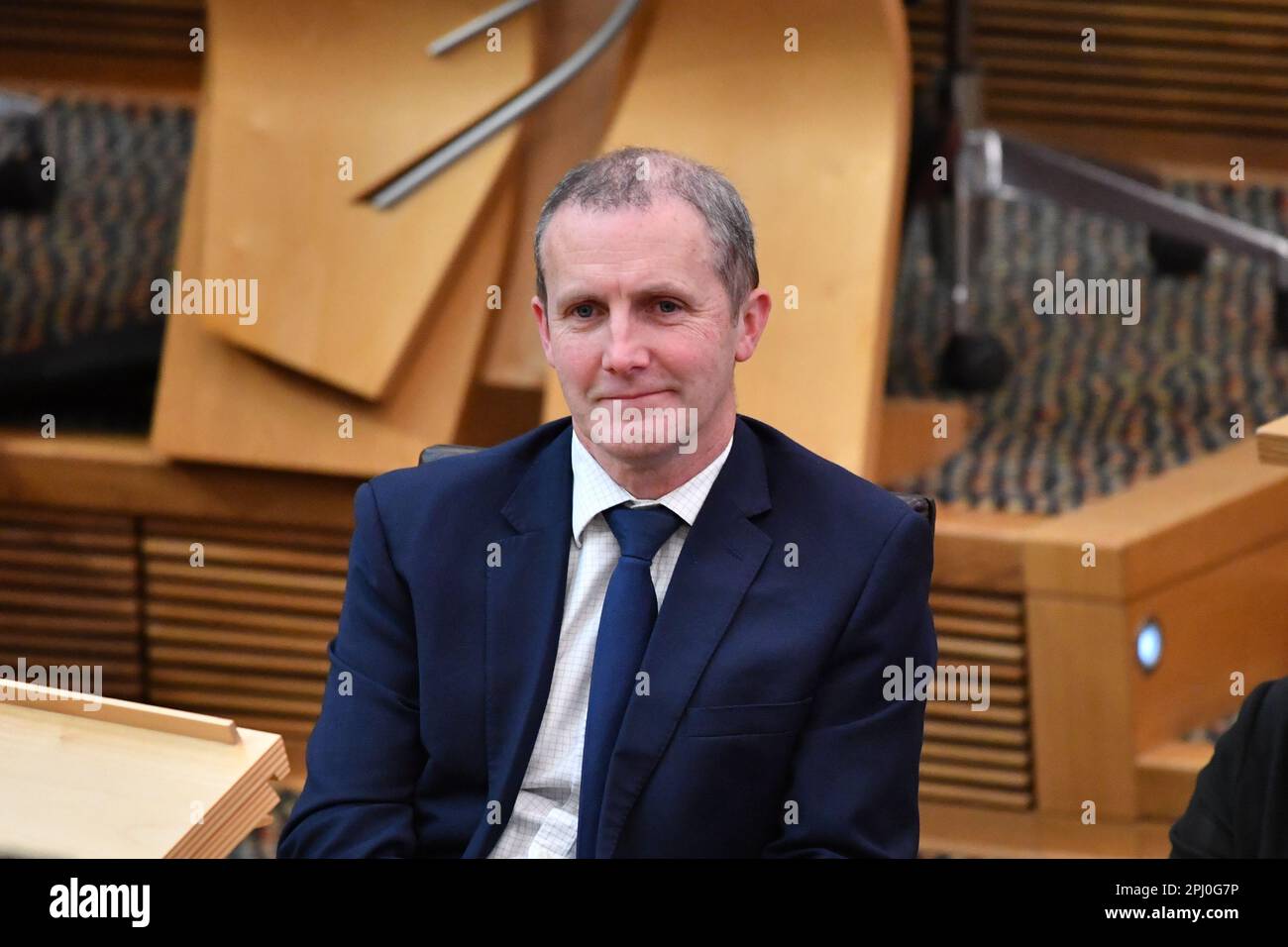 Edinburgh, Schottland, Großbritannien. 30. März 2023. IM BILD: Michael Mathieson MSP, Kabinettssekretär für NHS Recovery, Health and Social Care. Die Ernennung schottischer Minister, die vor und während der Nachmittagssitzung in der Kammer von Holyrood als neu gewählter erster Minister Schottlands gesehen wurden, Humza Yousaf MSP, ernennt verschiedene Minister. Kredit: Colin D Fisher/CDFIMAGES.COM Kredit: Colin Fisher/Alamy Live News Stockfoto