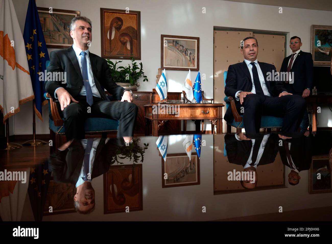 Cyprus Foreign Minister Constantinos Kombos, right, and Israeli