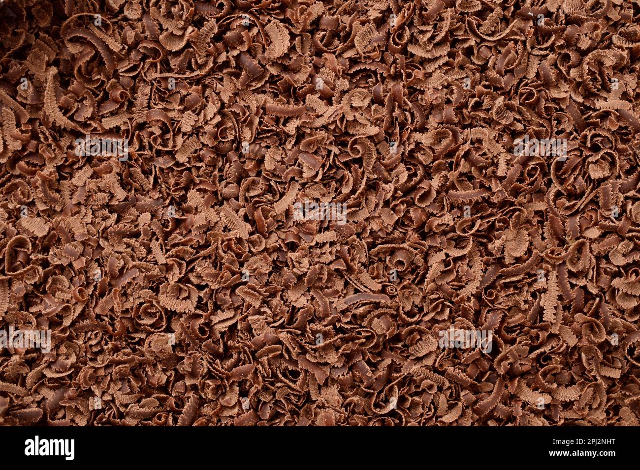 Draufsicht des Hintergrunds der Rasierstruktur mit Schokolade Stockfoto