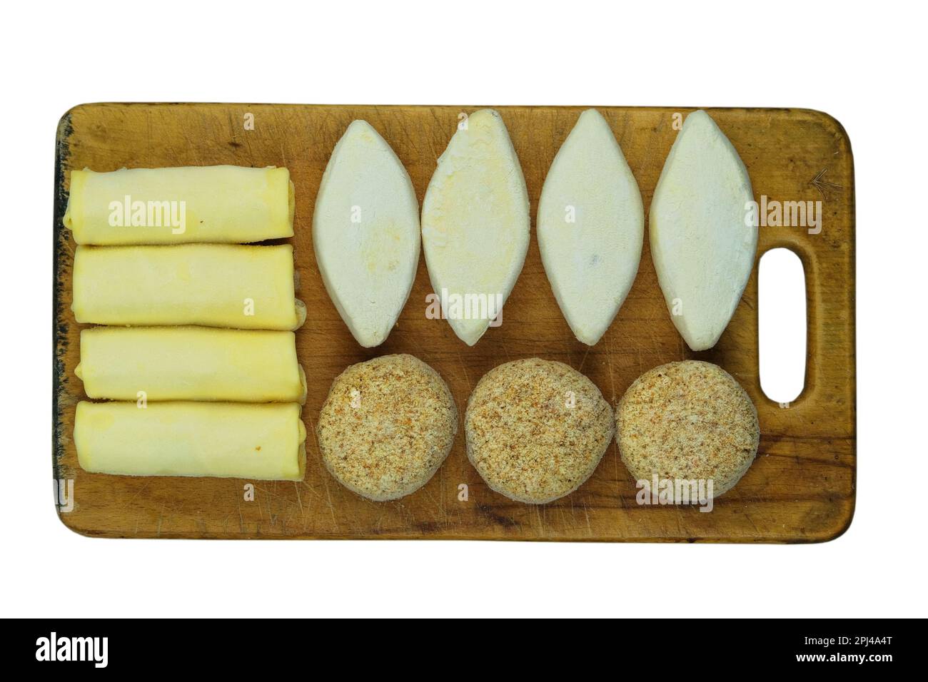 Verschiedene hausgemachte Halbfertigprodukte auf Holzbrettern. Gefrorene Schnitzel, Pfannkuchen. Zubereitungen aus hausgemachter Nahrung. Stockfoto Verschiedene hausgemachte Halbfertigprodukte auf Holzbrettern. Gefrorene Schnitzel, Pfannkuchen. Zubereitungen aus hausgemachter Nahrung. Stockfoto