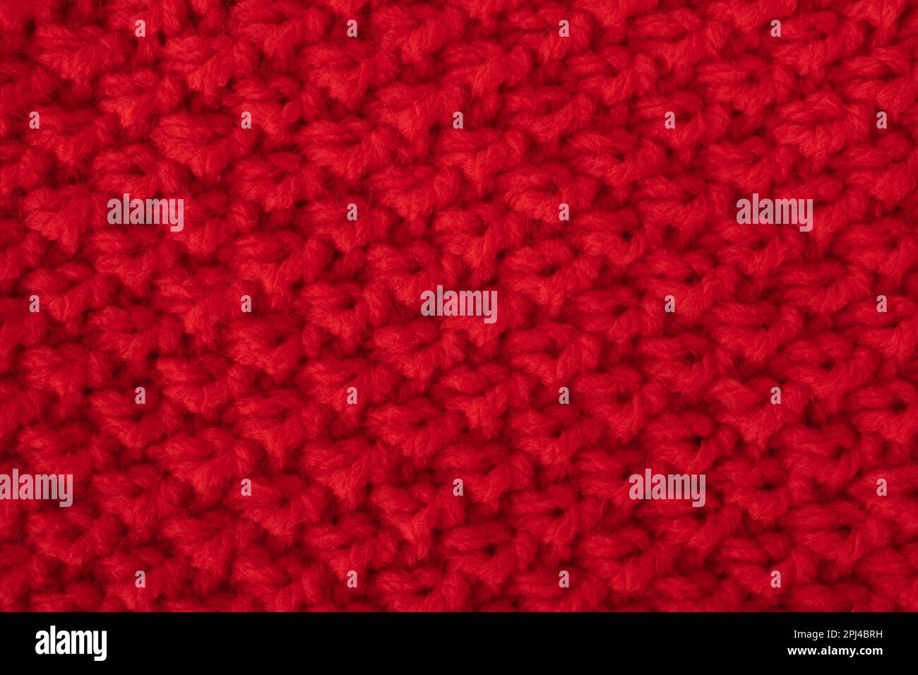 Roter Wollhintergrund mit Textur Stockfoto