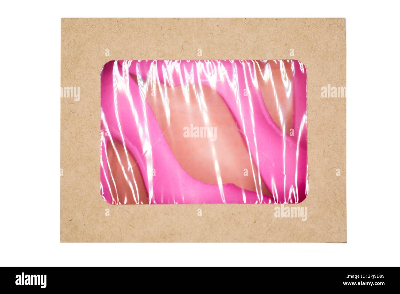 Ein Paar handgefertigte rosafarbene Seifenschuhe für Frauen in einer Schachtel. Stockfoto