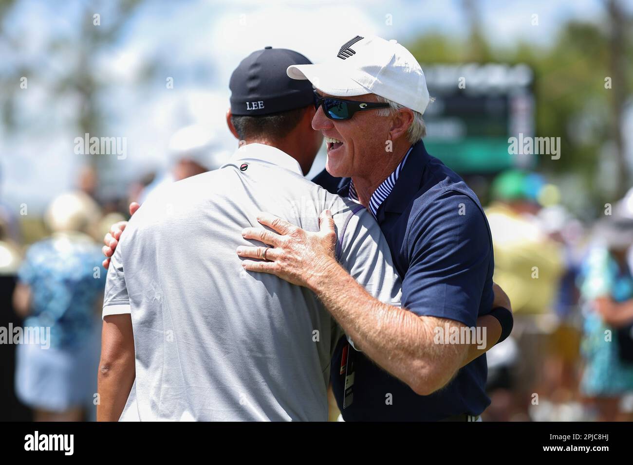 Danny Lee of Iron Heads GC hugs LIV Golf CEO, Greg Norman during the