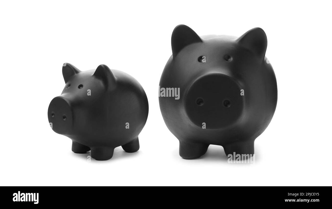 Schwarze Keramik-Sparschweine auf weißem Hintergrund Stockfoto