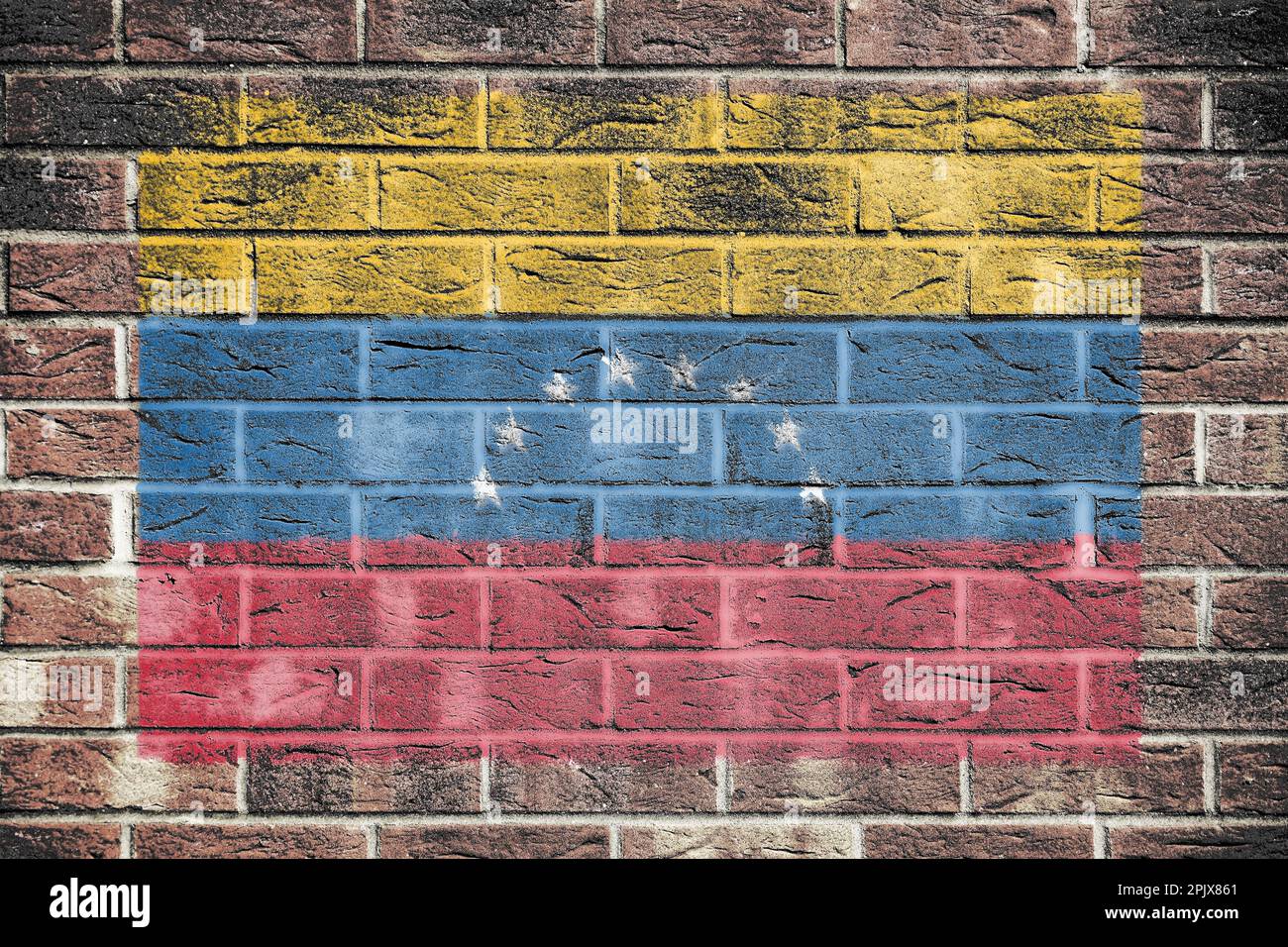 Venezolanische Flagge auf Backsteinhintergrund Stockfoto