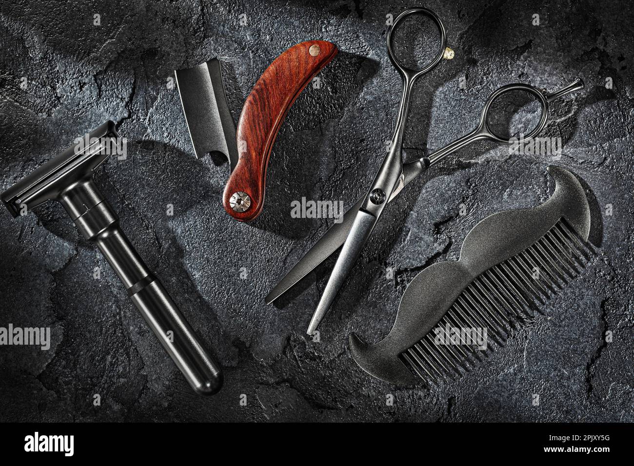 Schwarze Barbrbers Werkzeuge Auf Sone Slate Hintergrund Gesetzt Stockfoto