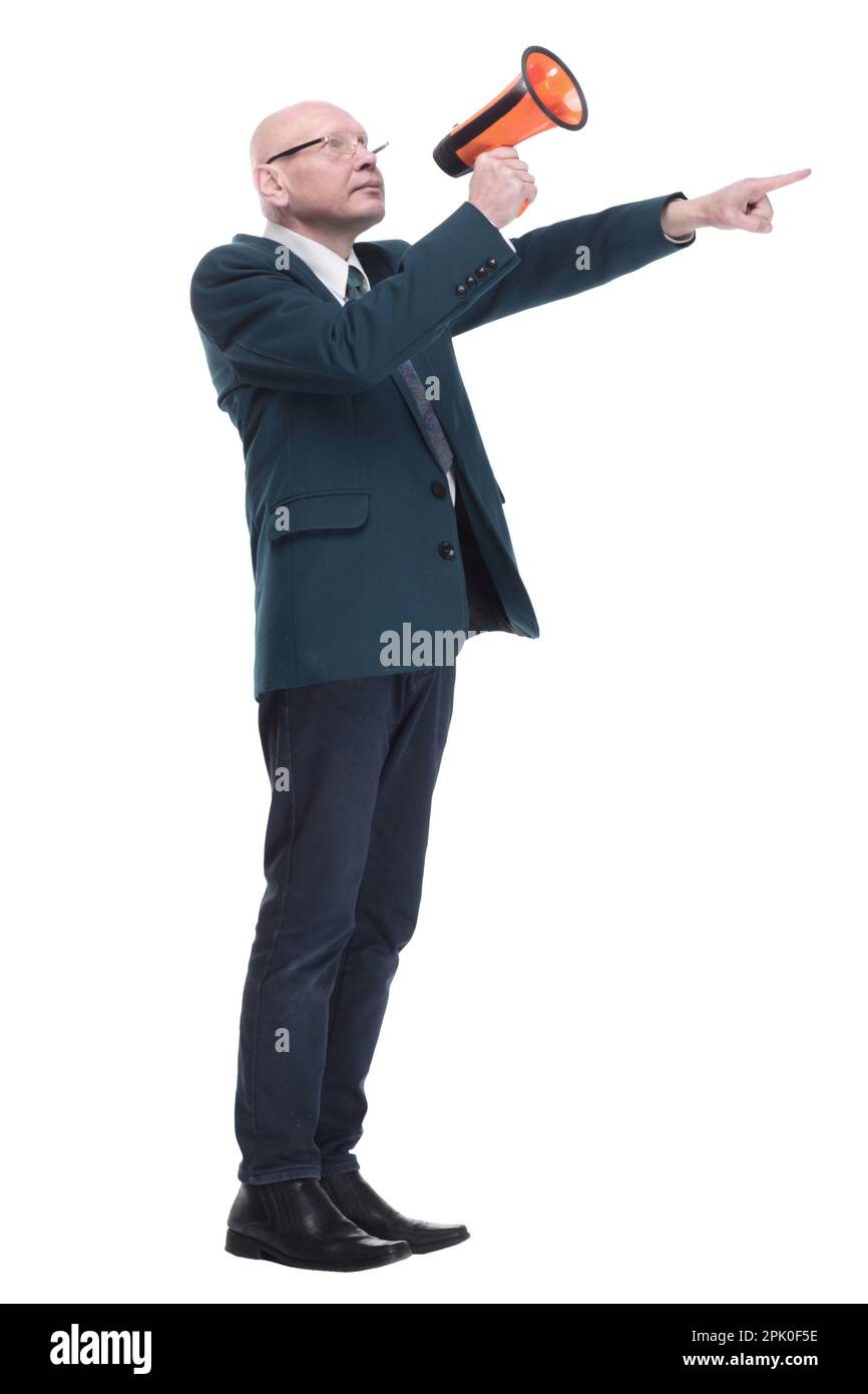 Irritierter Geschäftsmann im Gespräch durch ein Megaphon. In vollem Wachstum. Stockfoto