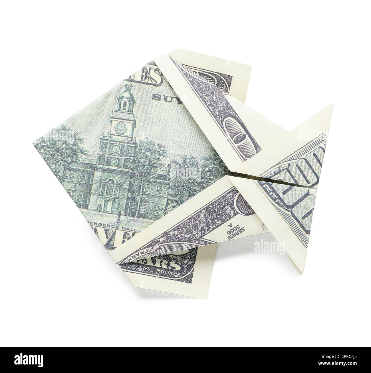 Origami-Fisch aus Dollar-Banknoten auf weißem Hintergrund Stockfoto