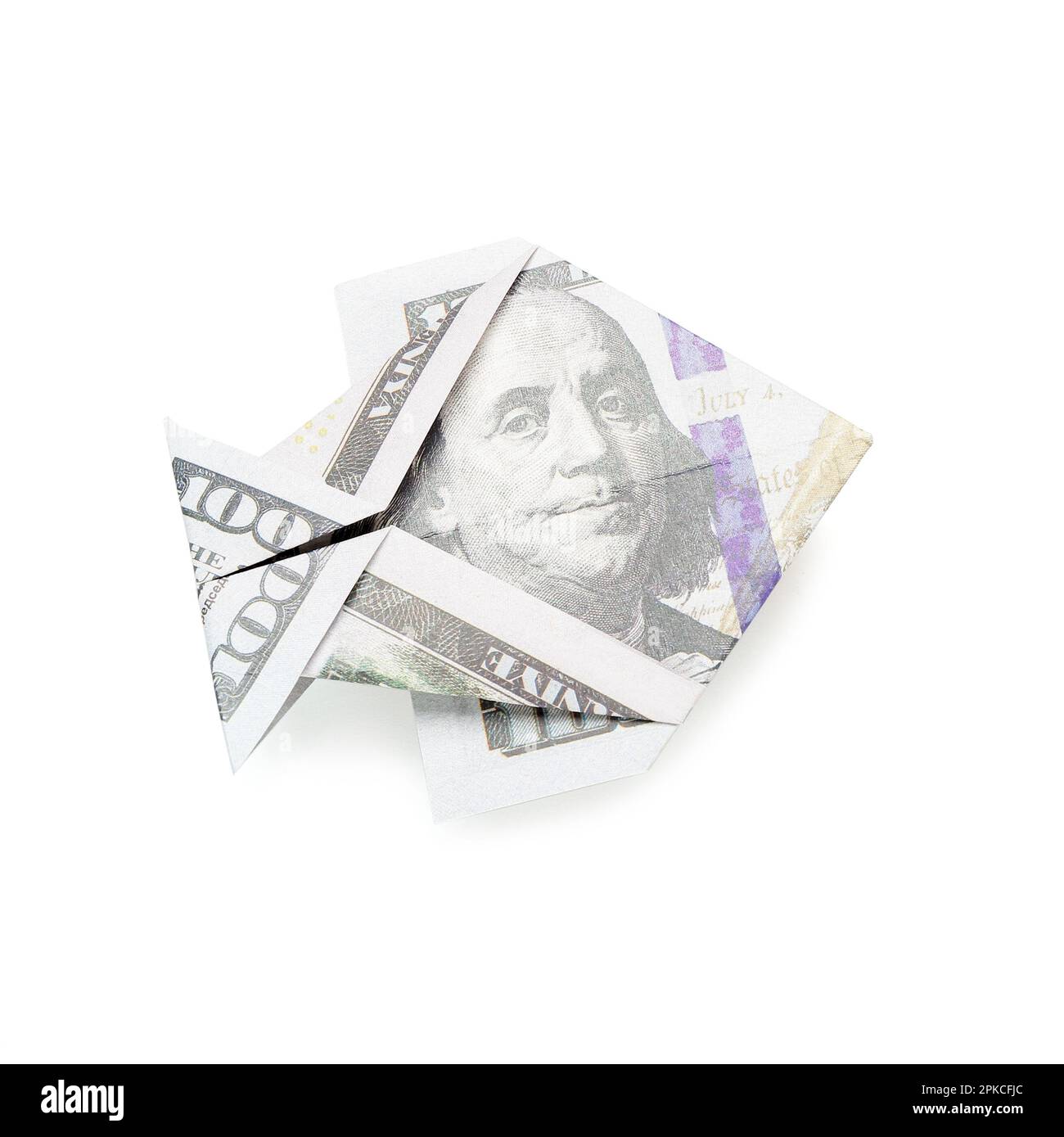 Origami-Fisch aus Dollar-Banknoten auf weißem Hintergrund Stockfoto