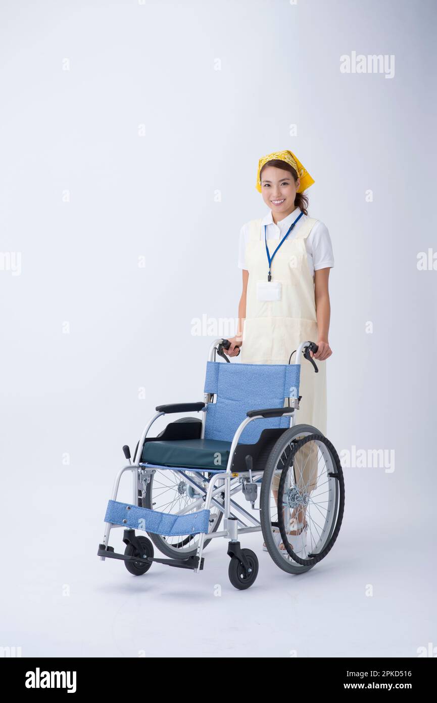 Rollstühle und Pflegekräfte Stockfoto