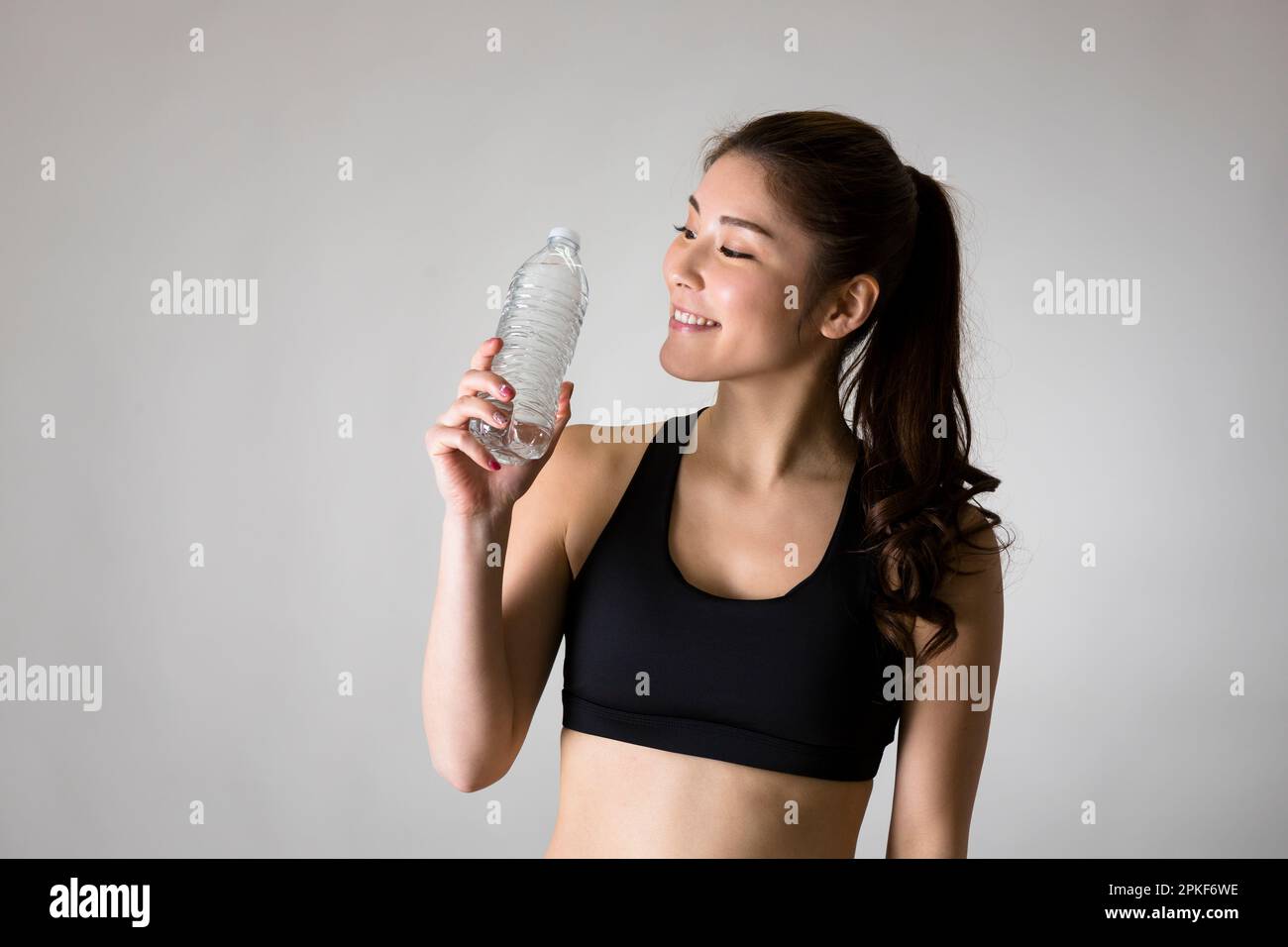 Frau in Sportbekleidung Stockfoto