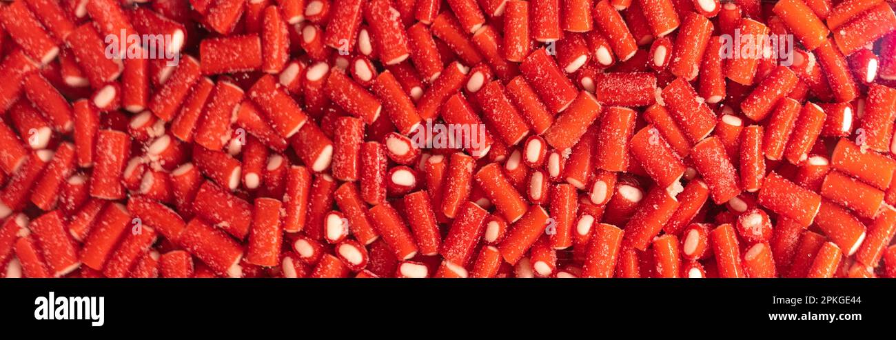 Rote Gummibonbons als Hintergrund Stockfoto