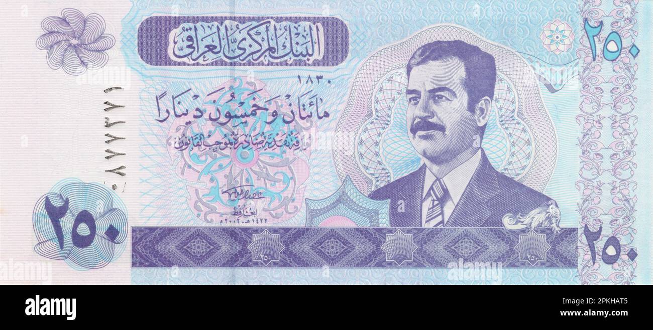 Blick auf die Aussichtsseite einer irakischen Banknote mit zweihundertfünfzig Dinar, herausgegeben im Jahr 2002, mit dem Bild von Saddam Hussein. Stockfoto