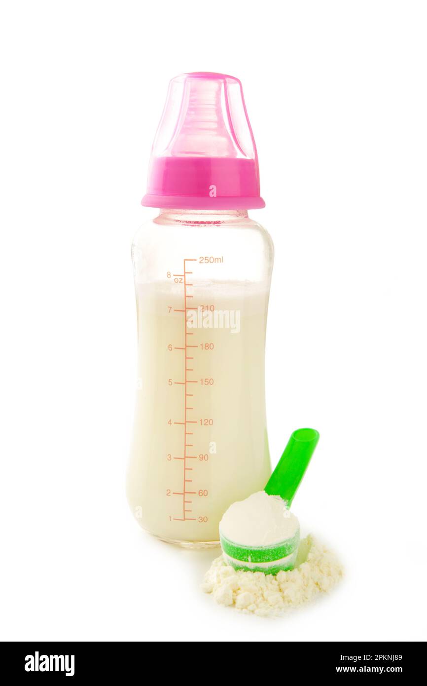 Babymilchflasche mit Puder isoliert auf weißem Hintergrund. Draufsicht Stockfoto