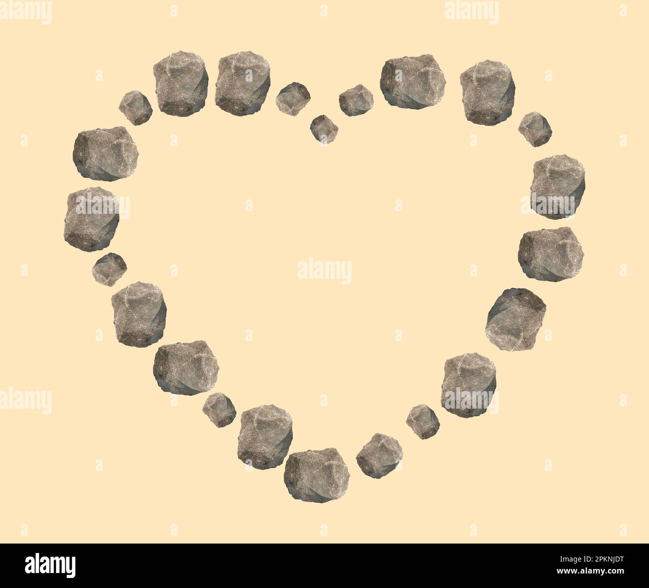 Herz aus Steinen auf hellgelbem Hintergrund isoliert Stockfoto