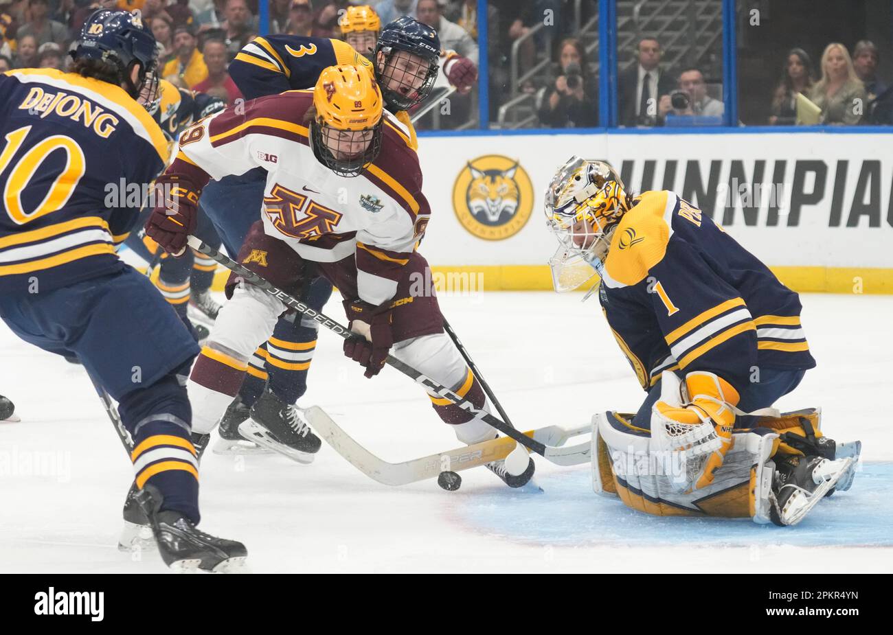 Minnesota forward Matthew Knies (89) shoots on Quinnipiac goaltender