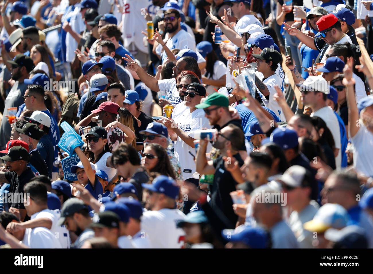 LOS ANGELES, CA - APRIL 02: Dodger fans gesture during the seventh inning stretch in a regular season game between the Arizona Diamondbacks and Los Angeles Dodgers on April 2, 2023, at Dodger Stadium in Los Angeles, CA. (Photo by Brandon Sloter/Icon Sportswire) (Icon Sportswire via AP Images) Stockfoto