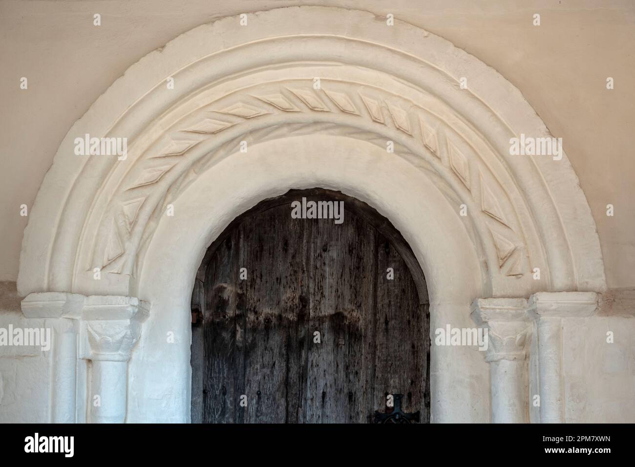 Norman Arch, St. John der Täufer Kirche, Butley, Suffolk, England Stockfoto