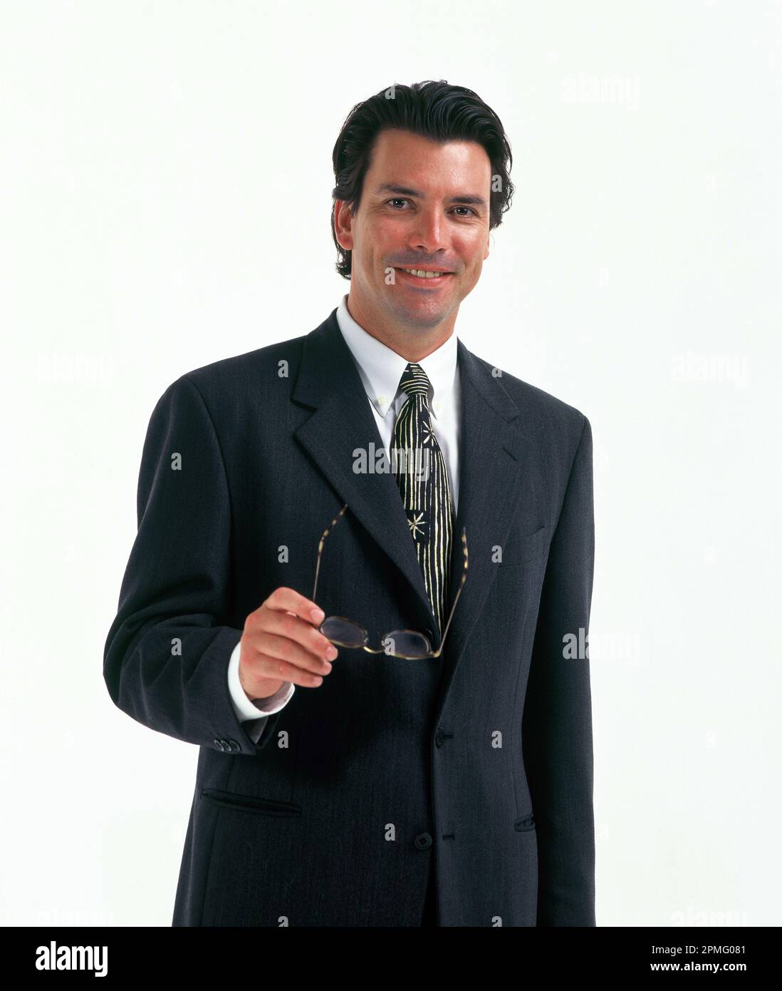 Geschäftlich. Studiobild eines jungen Mannes im Anzug. Stockfoto