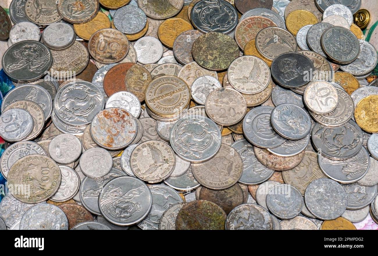 Alte indonesische Geldmünzen für Vintage-Hintergrund oder Tapeten Stockfoto