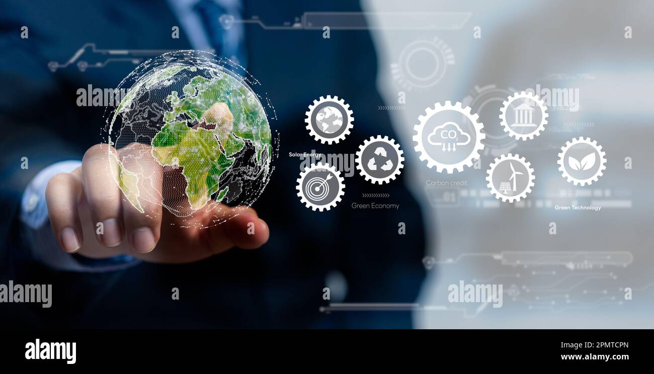 Geschäftsmann, der die globale Ikone berührt, reduziert den CO2-Ausstoß CO2-Fußabdruck Klimawandel.Nachhaltige Entwicklung und Innovation umweltfreundliches Geschäftskonzept. Stockfoto