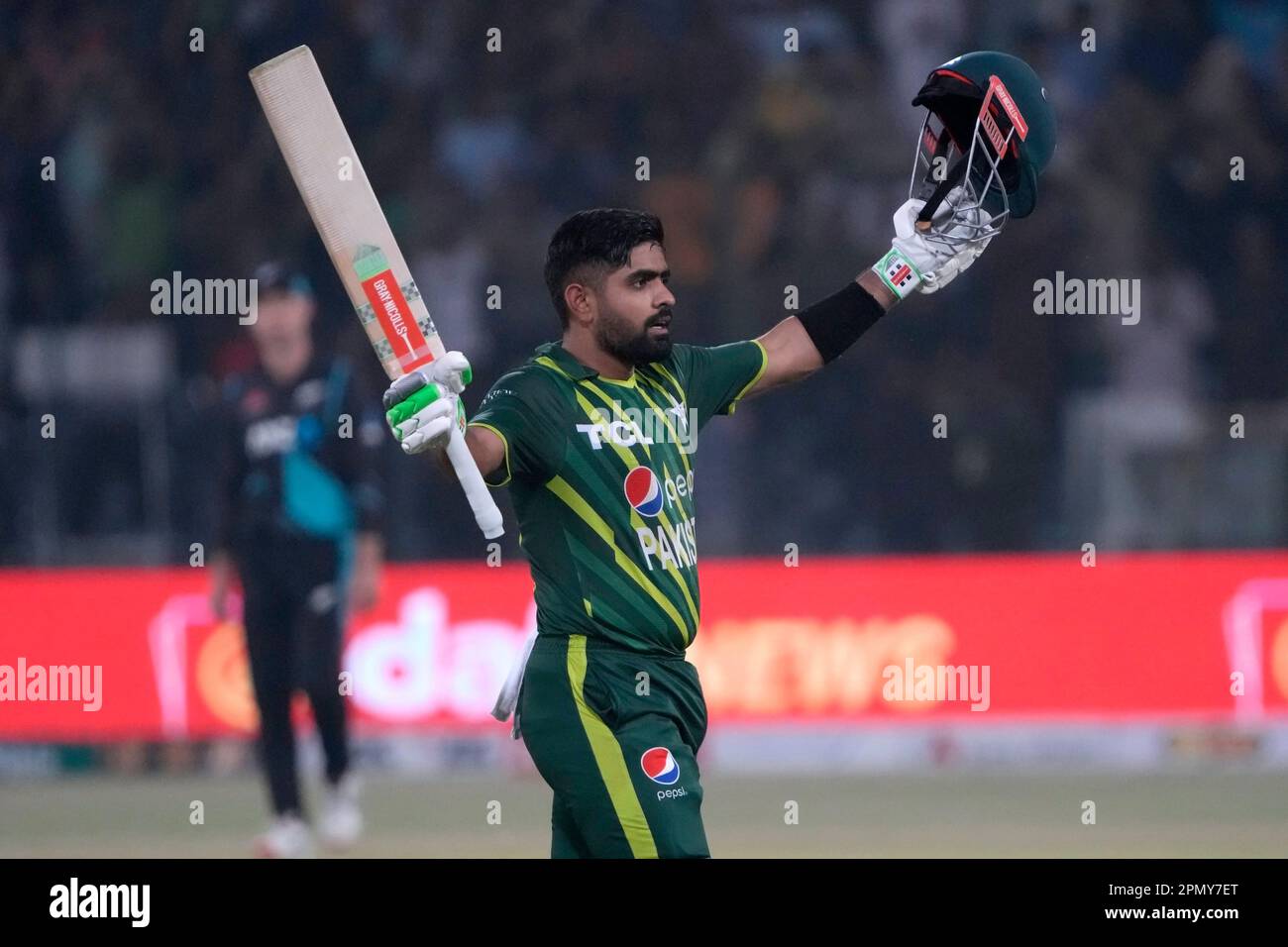 Pakistan's Babar Azam celebrates after his century during the second twenty20 cricket match between Pakistan and New Zealand, in Lahore, Pakistan, Saturday, April 15, 2023. (AP Photo/K.M. Chaudary) Stockfoto