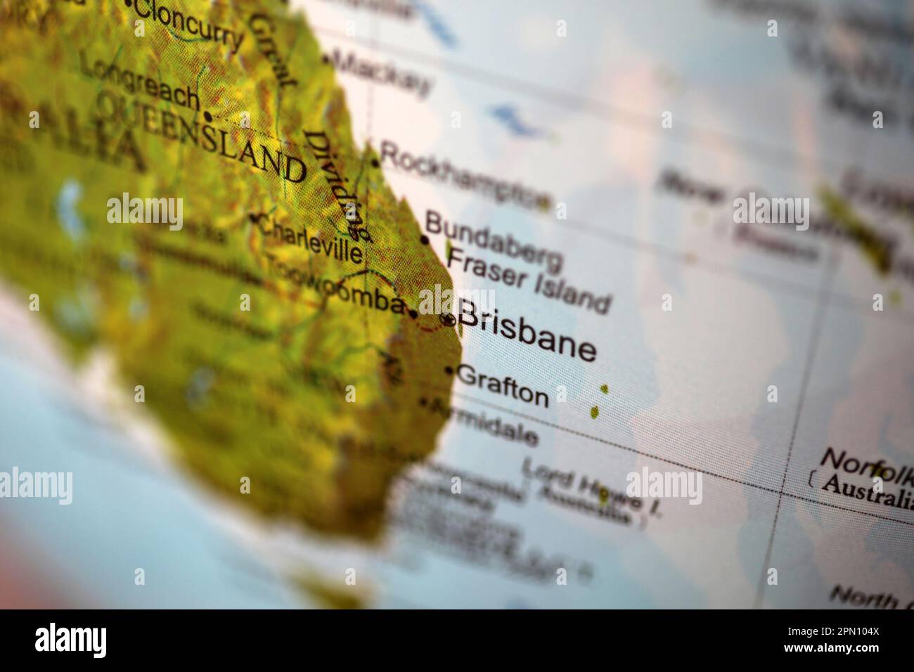 Nahaufnahme von Brisbane, Australien und der Ostküste Australiens auf einer Weltkugel. Absichtlich geringe Schärfentiefe Stockfoto