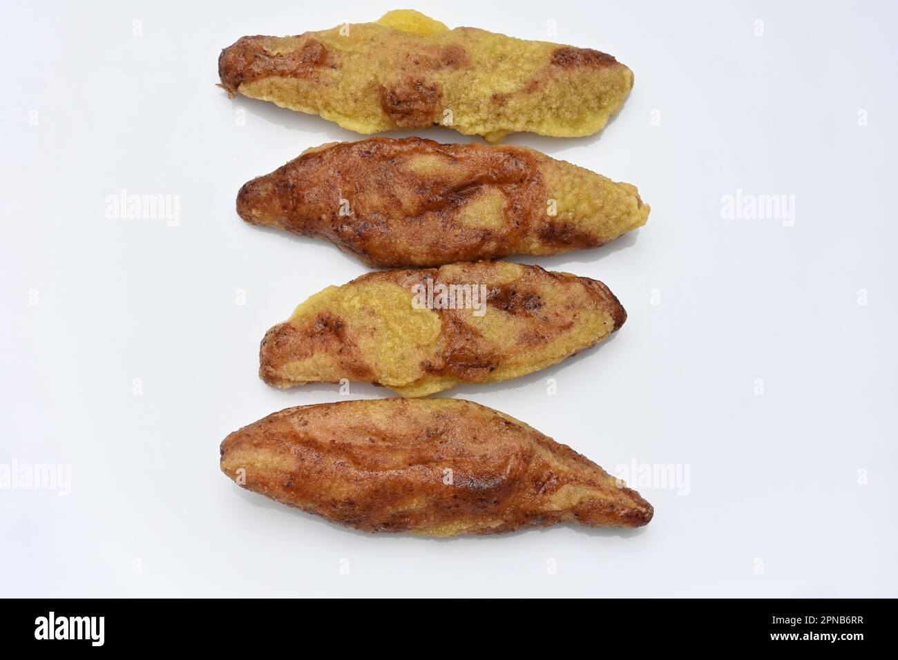 Frittierte, äußerst leckere süße Sri-lankische Snacks namens Athirasa, die Süßigkeiten werden aus dem Mischen von grünem Gramm Mehl und Reismehl mit Zucker hergestellt Stockfoto