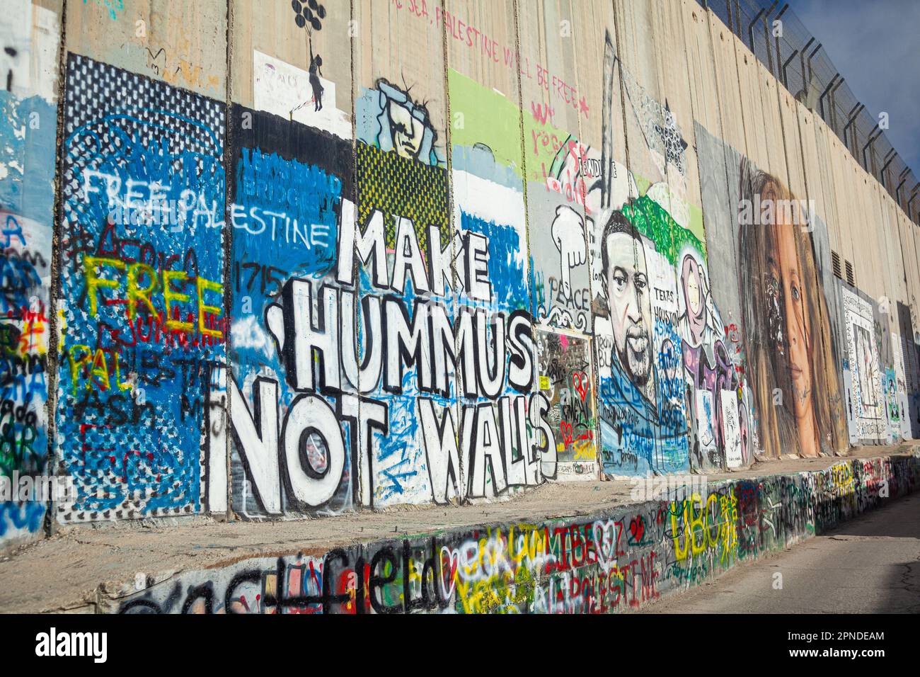 Machen Sie Hummus nicht zu Wandbildern an der Mauer in Bethlehem, Palästina Stockfoto