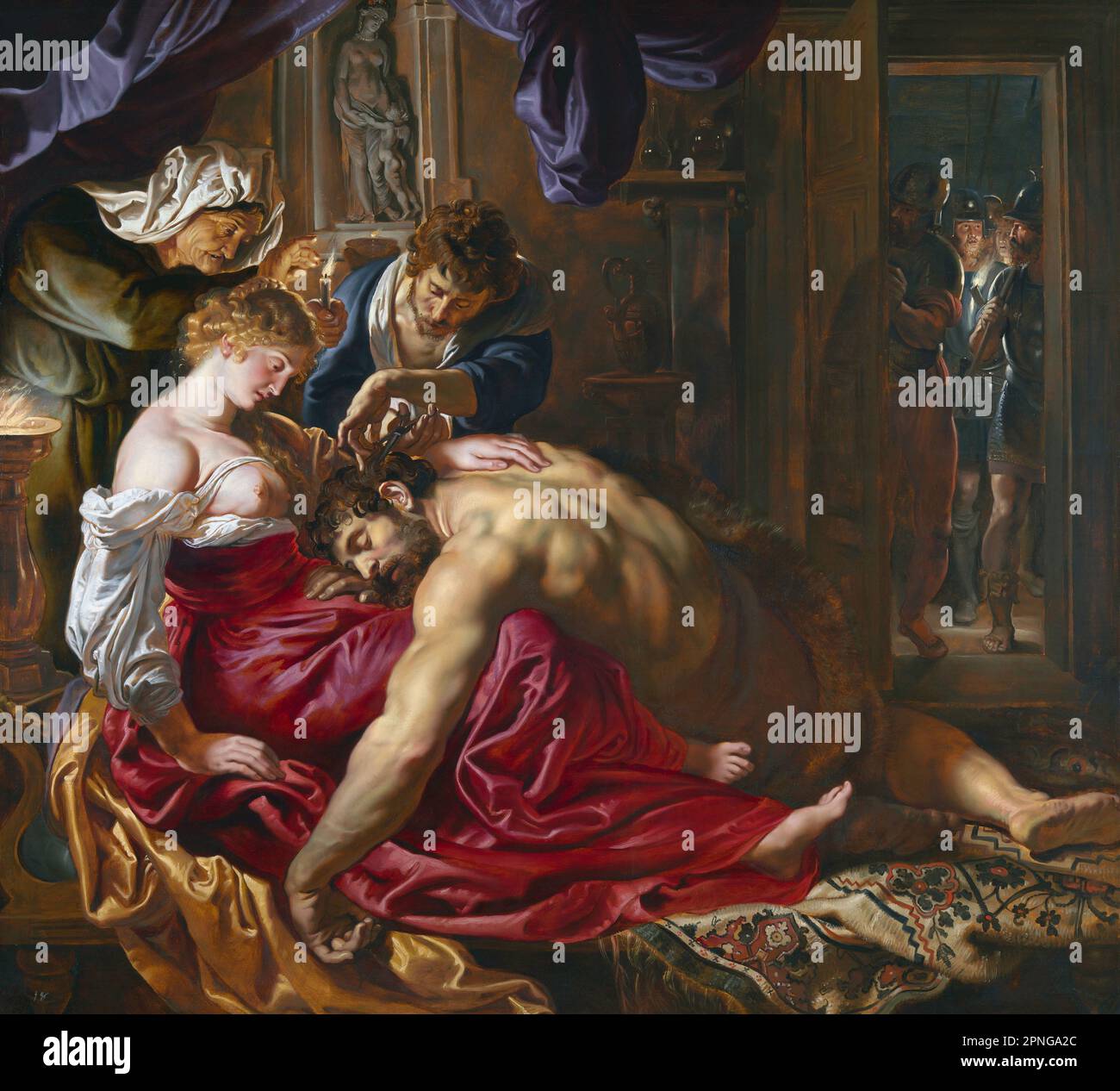 Belgien: ‘Samson und Delilah'. Öl auf Holz Gemälde von Peter Paul Rubens (28. Juni 1577 - 30. Mai 1640), c. 1609-1610. In der klassischen Erzählung aus der hebräischen Bibel oder dem christlichen Alten Testament ist Samson ein Israelit von großer physischer Stärke. Er vertraut seinem Geliebten Delilah an, dass das Geheimnis seiner Stärke seine langen Haare sind, die seit dem Tag seiner Geburt nie geschnitten wurden. Delilah – vielleicht eine der ersten ‘„Femmes fatales“ der Geschichte – verrät Samson, indem er seine Feinde informiert. In dieser berühmten Szene schläft Samson im Schoß seiner Herrin, die zwei Komplizen dazu auffordert, Samsons Haare zu schneiden. Stockfoto