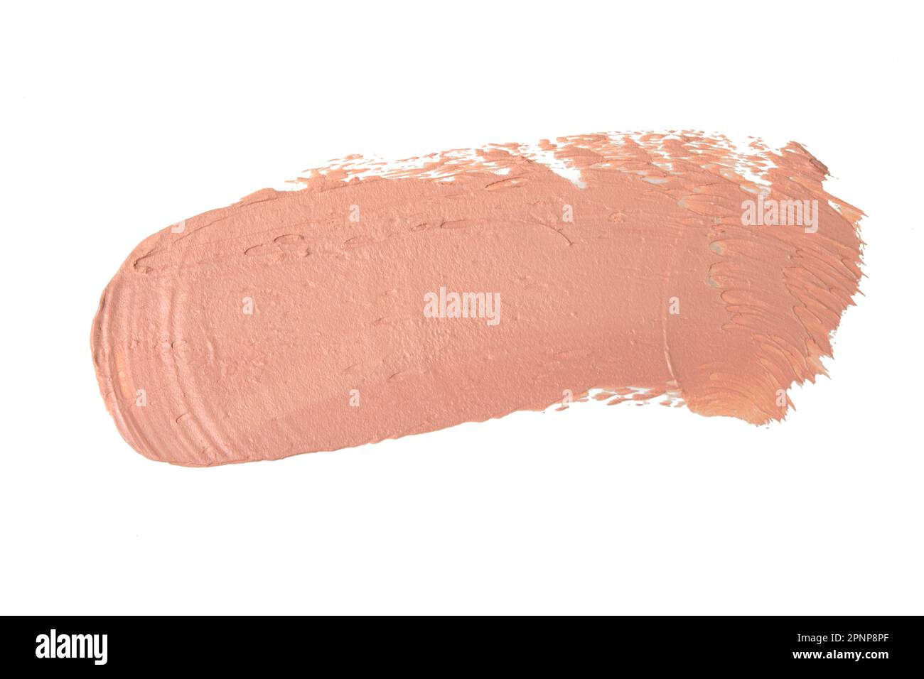 Abstrich und Textur von cremefarbenem Lippenstift oder Acrylfarbe, isoliert auf weißem Hintergrund. Stockfoto