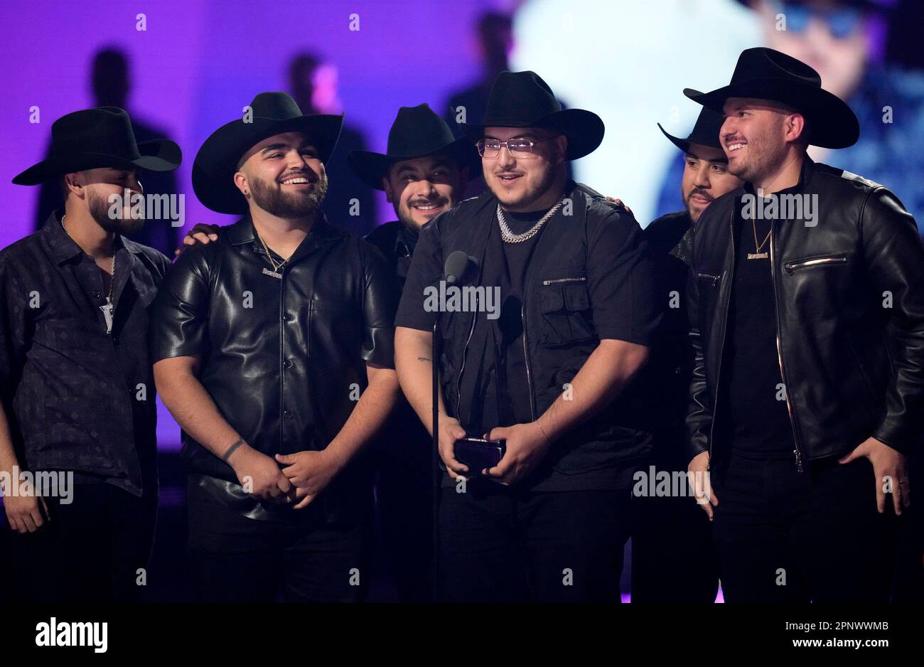 Grupo Frontera accepts the award for best regional mexican song for "No
